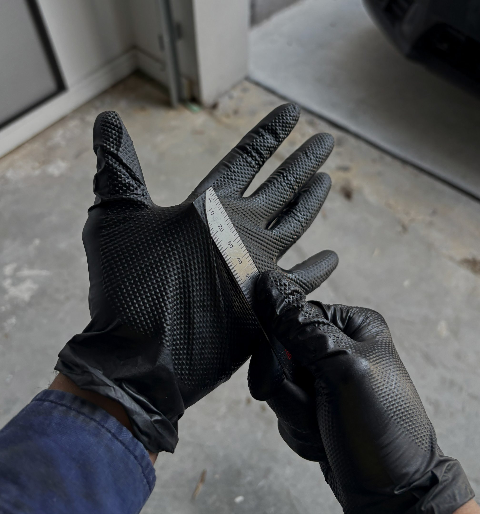 BLACKPALM gloves being worn during heavy-duty workshop task