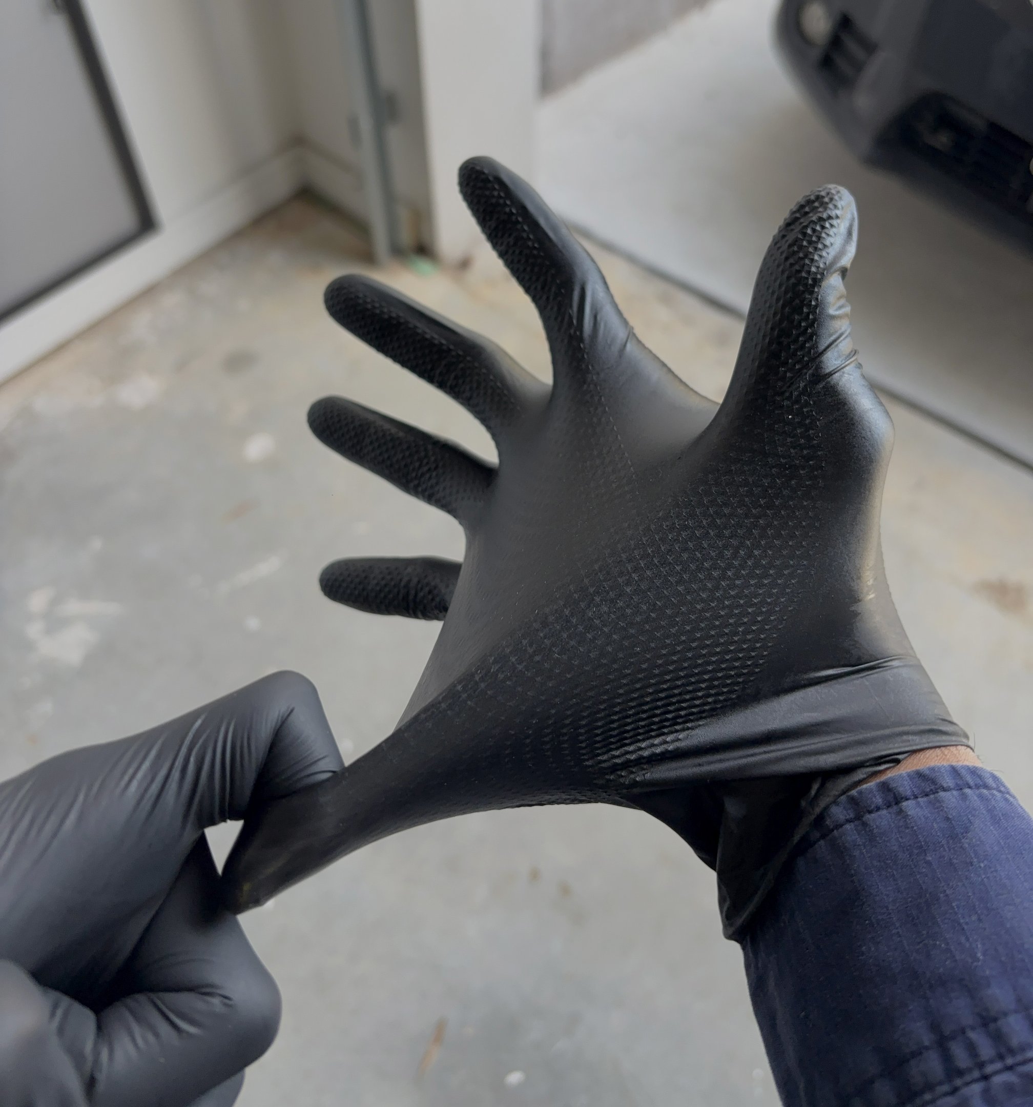 BLACKPALM heavy duty nitrile glove holding up on the job