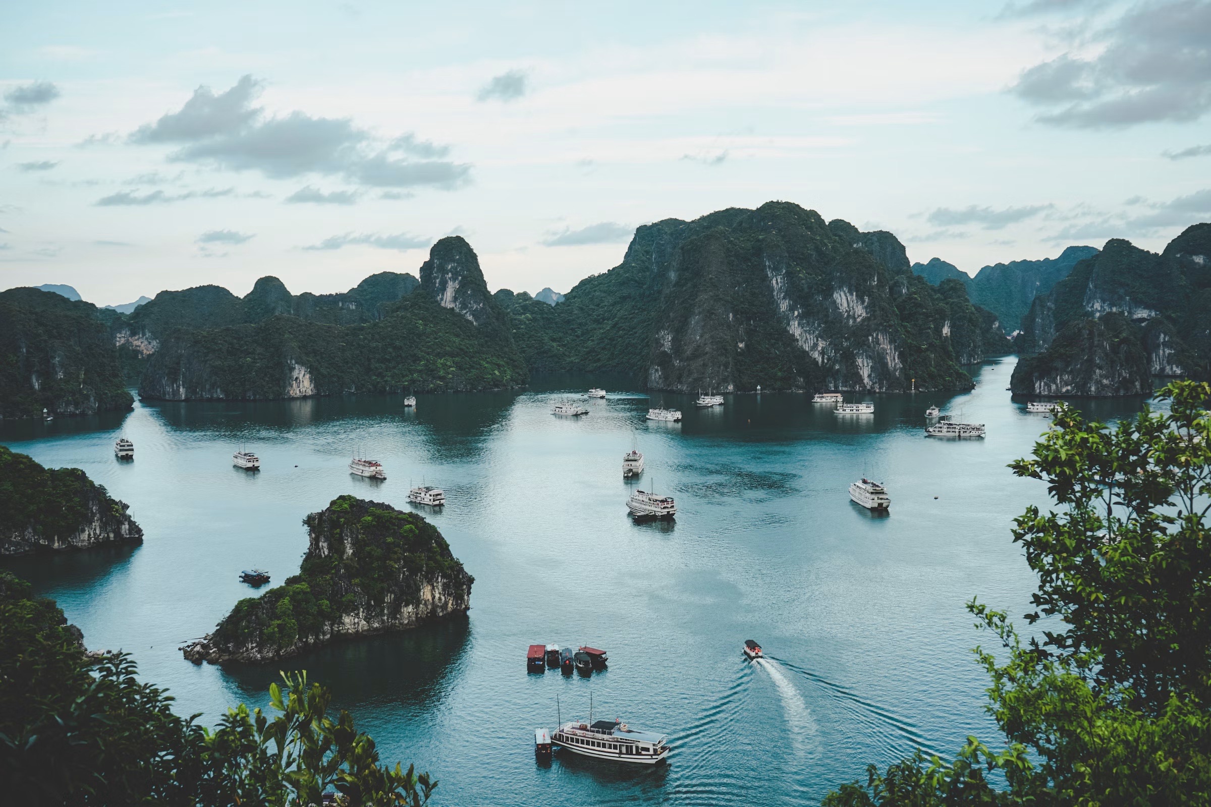 Boats among the limestone islands of Halong Bay