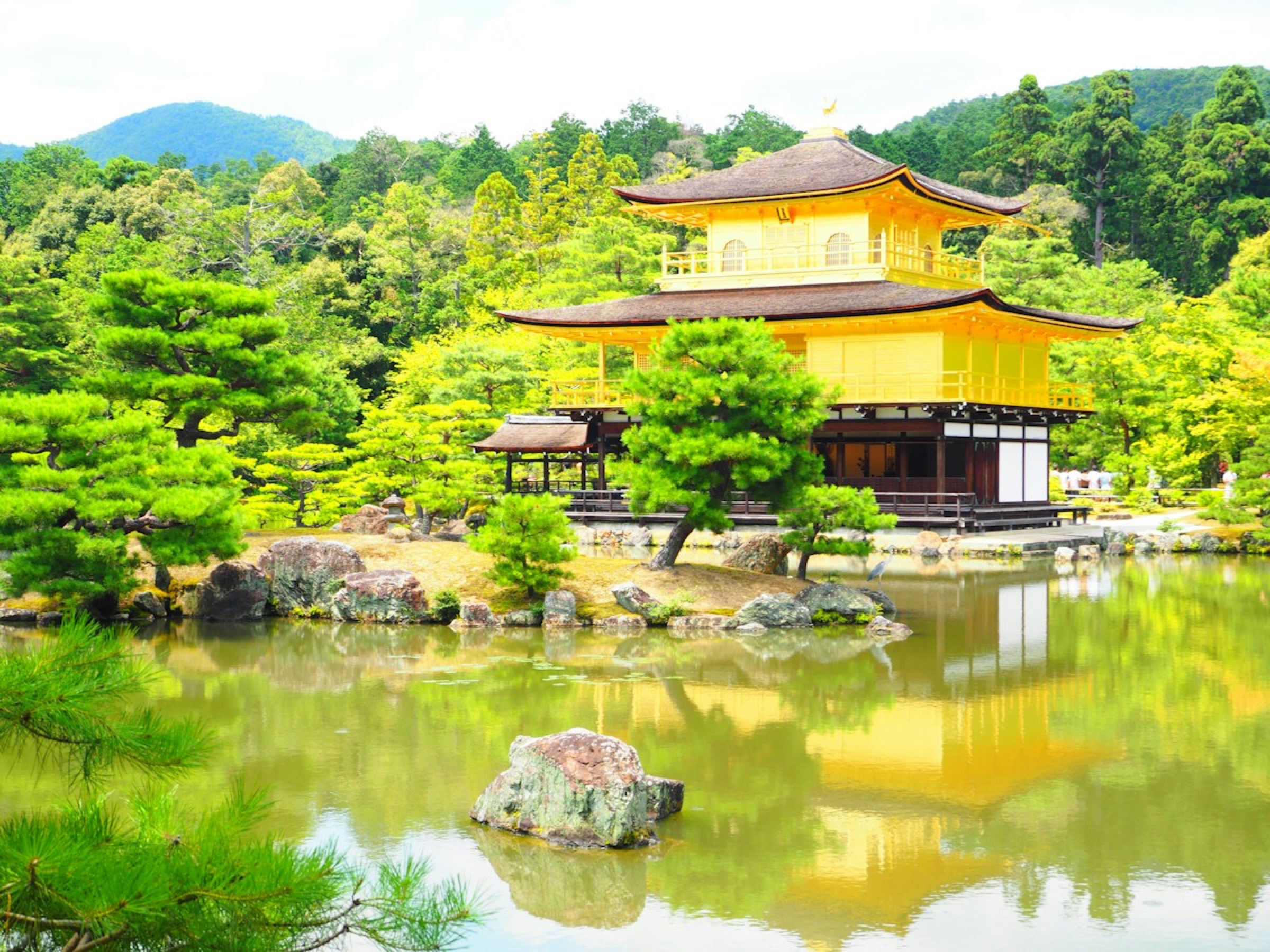 The Golden Pavilion reflected in its pond in Kyoto