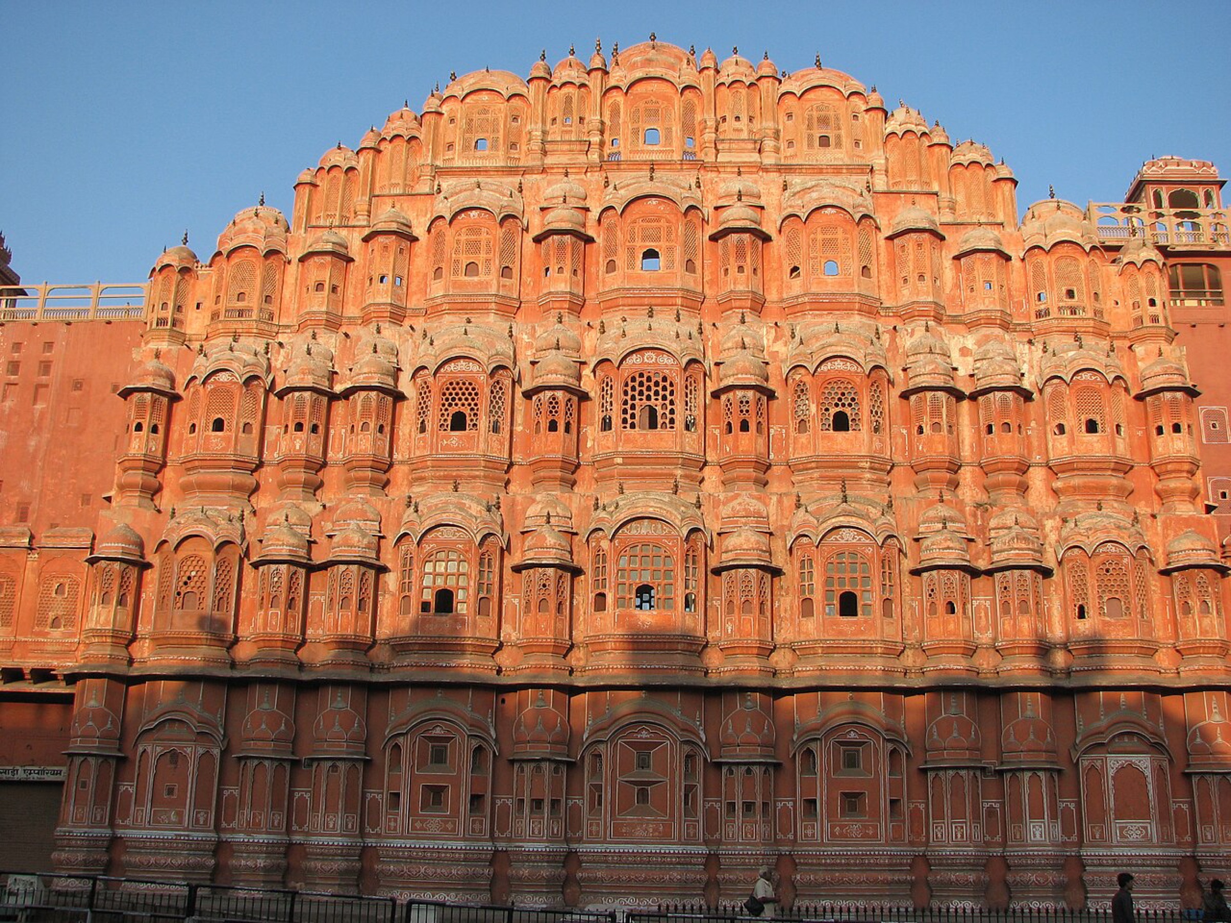 The pink sandstone façade of the Hawa Mahal in Jaipur