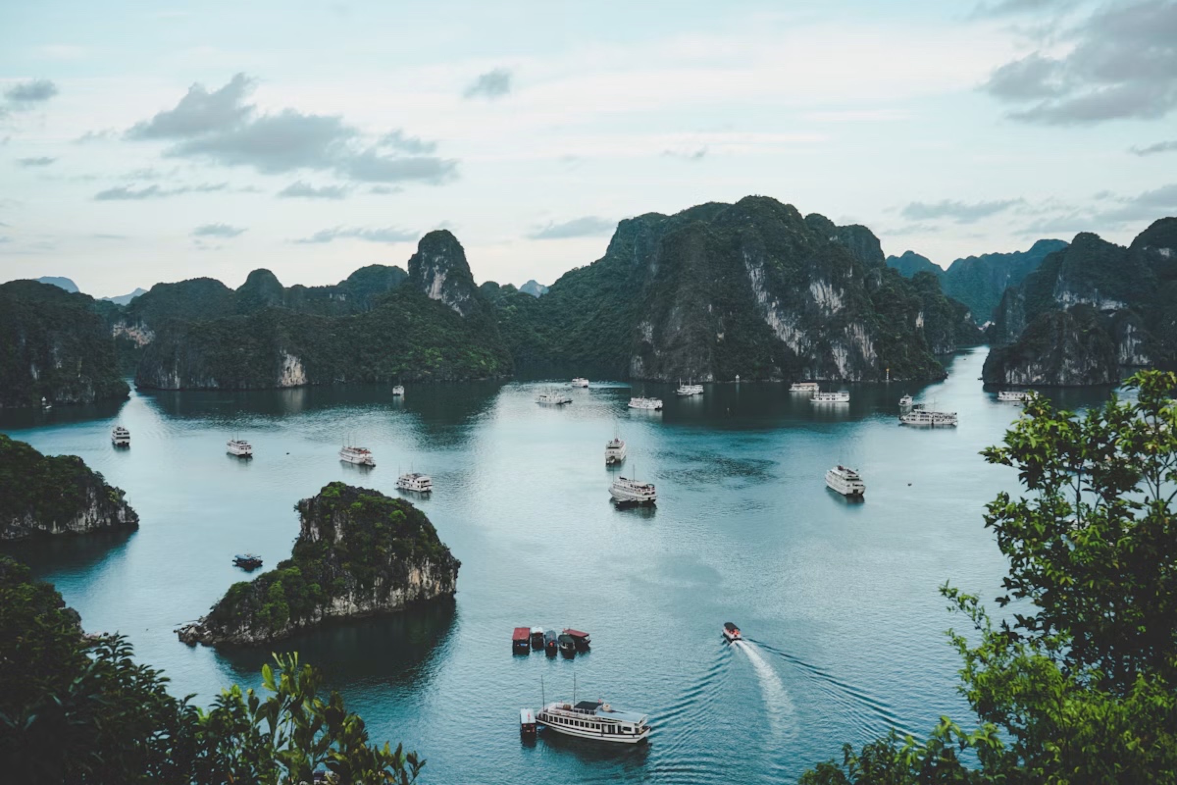 Cruise boats among the limestone islands of Halong Bay