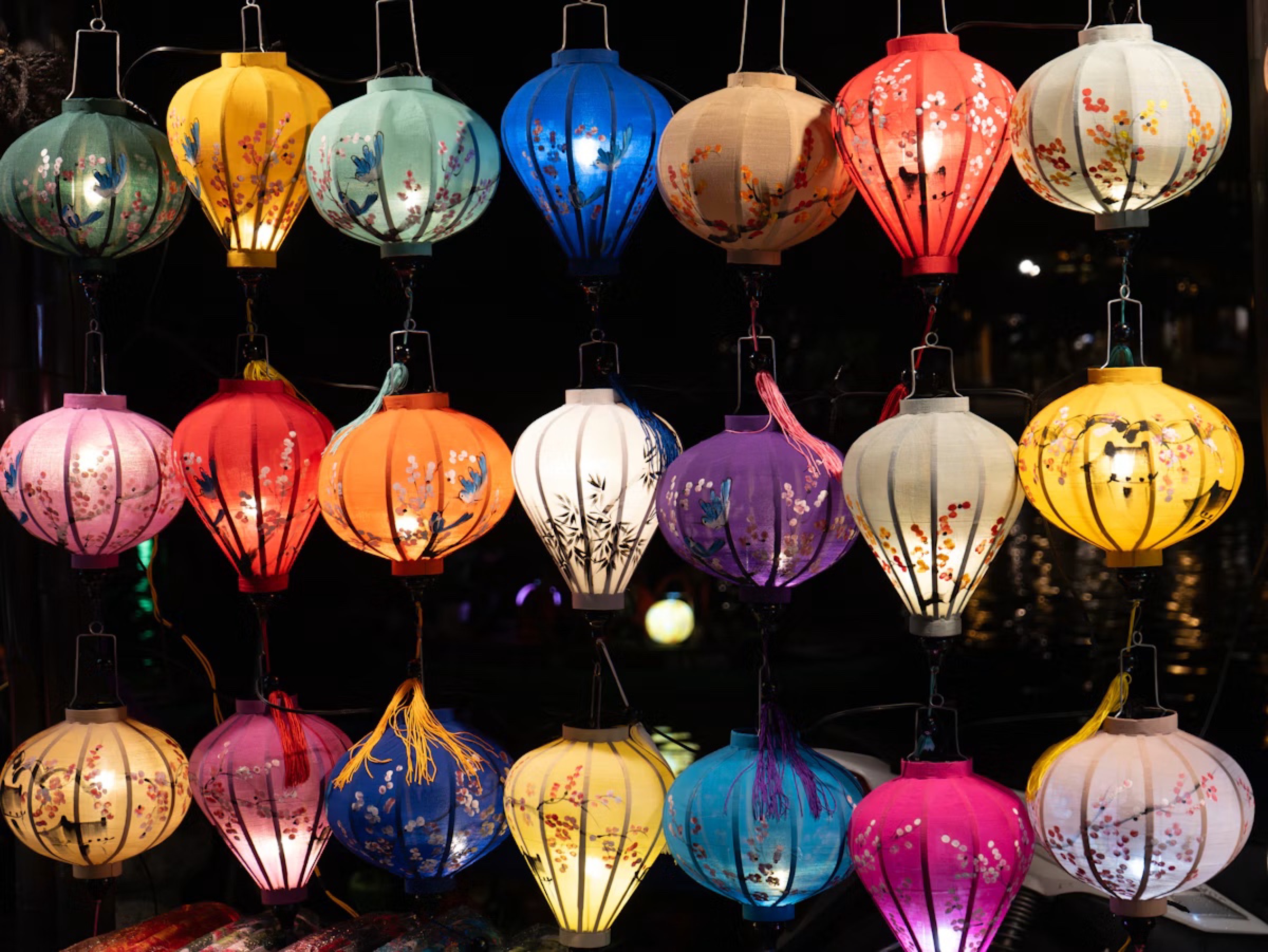Colourful silk lanterns glowing in Hoi An